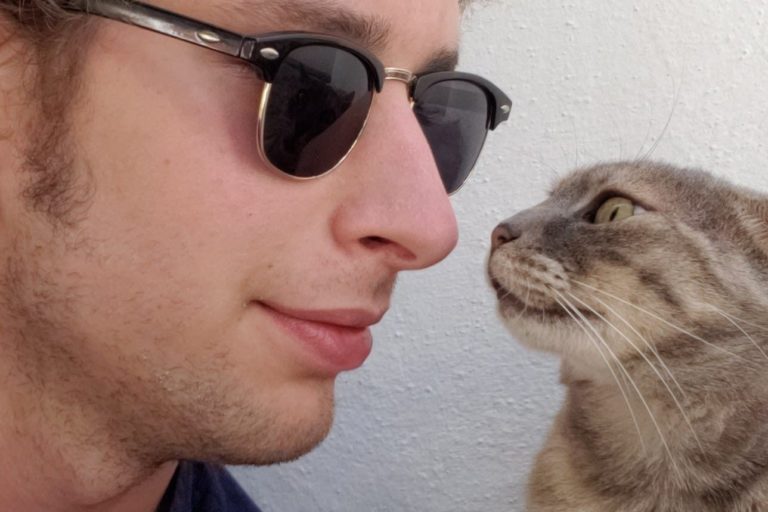 67738429_2786562641389009_2423702576877797376_o person with cat